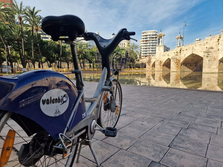 A Valenbisi hire bike beside the Puente del Mar in Valencia's Turia river park, the old riverbed turned into gardens