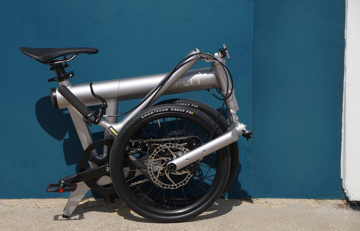 FLIT M2i folded, 797mm long and rolling on its own wheels. Image credit: FLIT